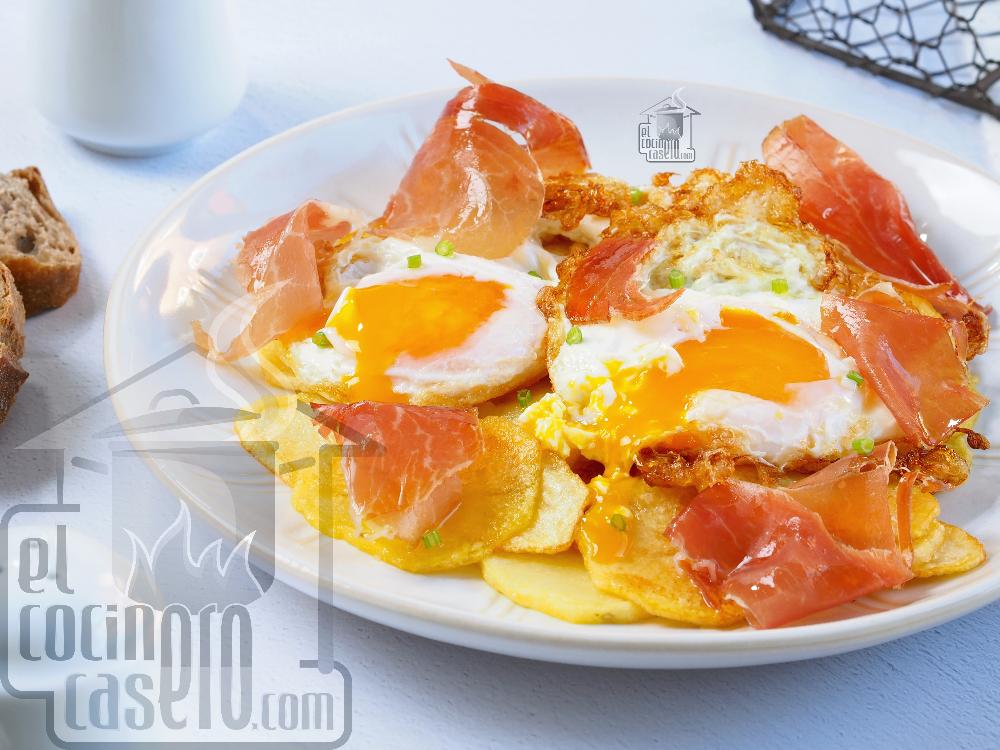 Huevos rotos con jamón